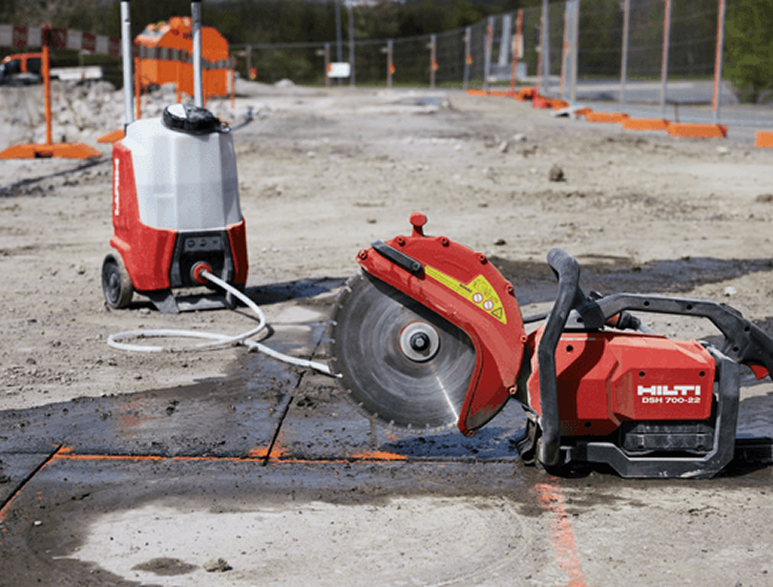 Hand saw cutting concrete wall